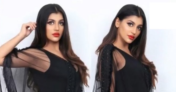 Yashika anandh hot glamour show in white coat and seducing dress