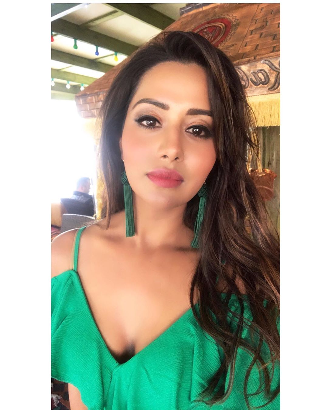 Raiza wilson hot posing in tight fit showing shape and structure pink dress