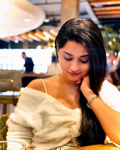 Arthana binu hot photos in sleeveless modern dress getting viral on internet