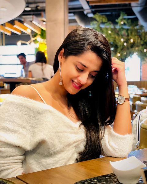 Arthana binu hot photos in sleeveless modern dress getting viral on internet