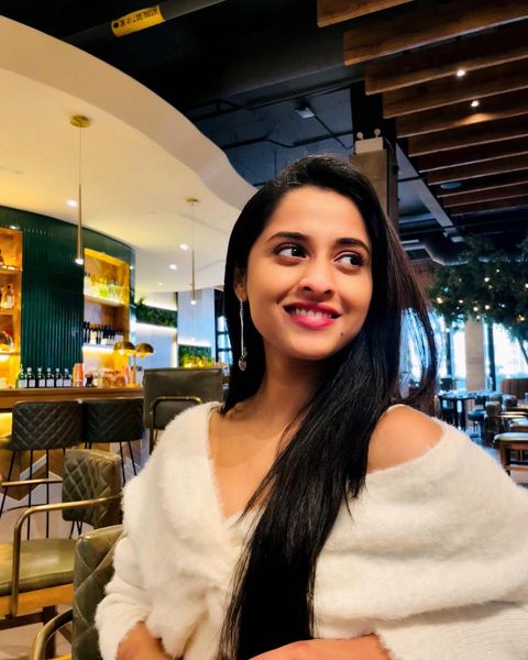 Arthana binu hot photos in sleeveless modern dress getting viral on internet