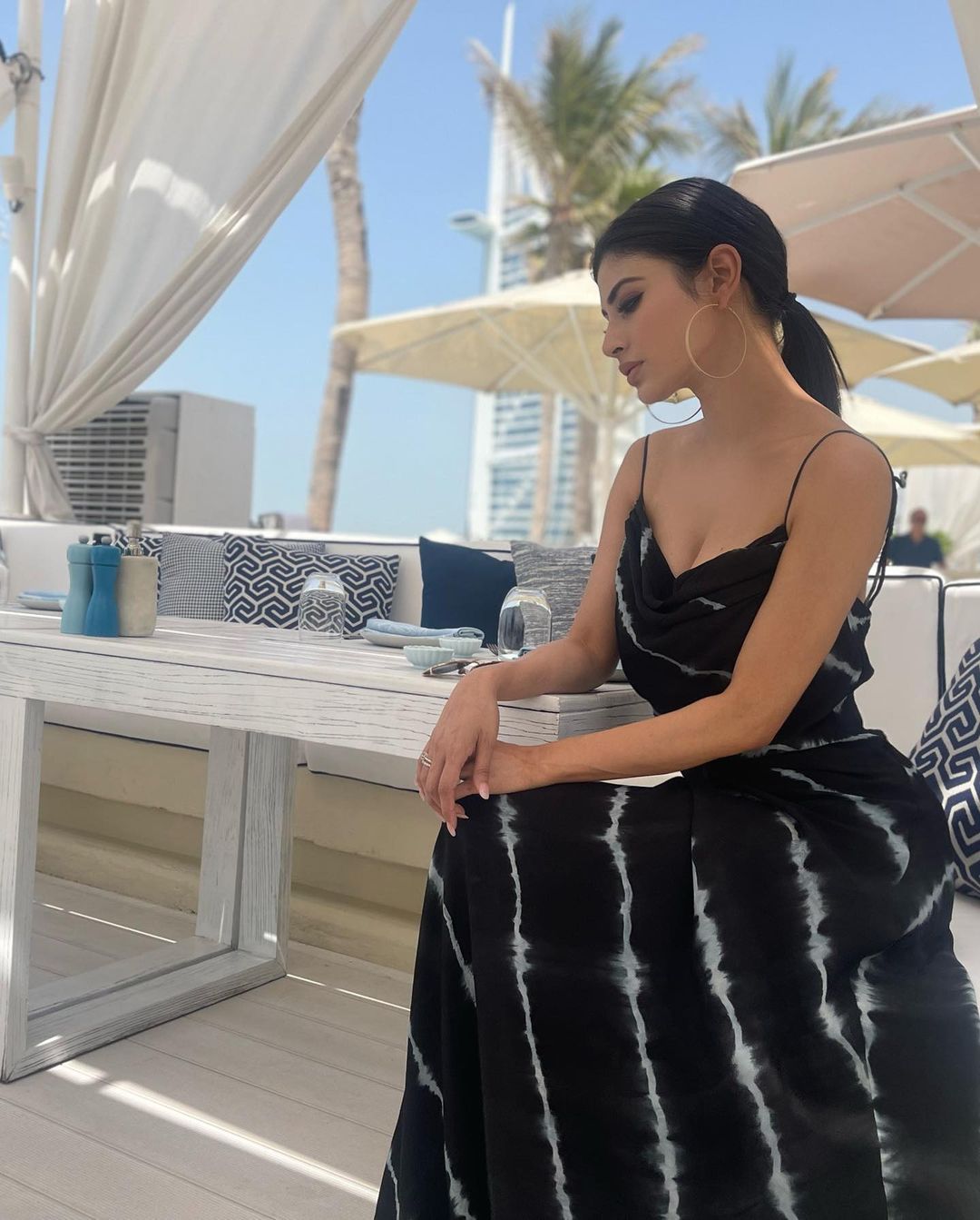 Mouni roy hot low neck fit tight dress photos on her vacation