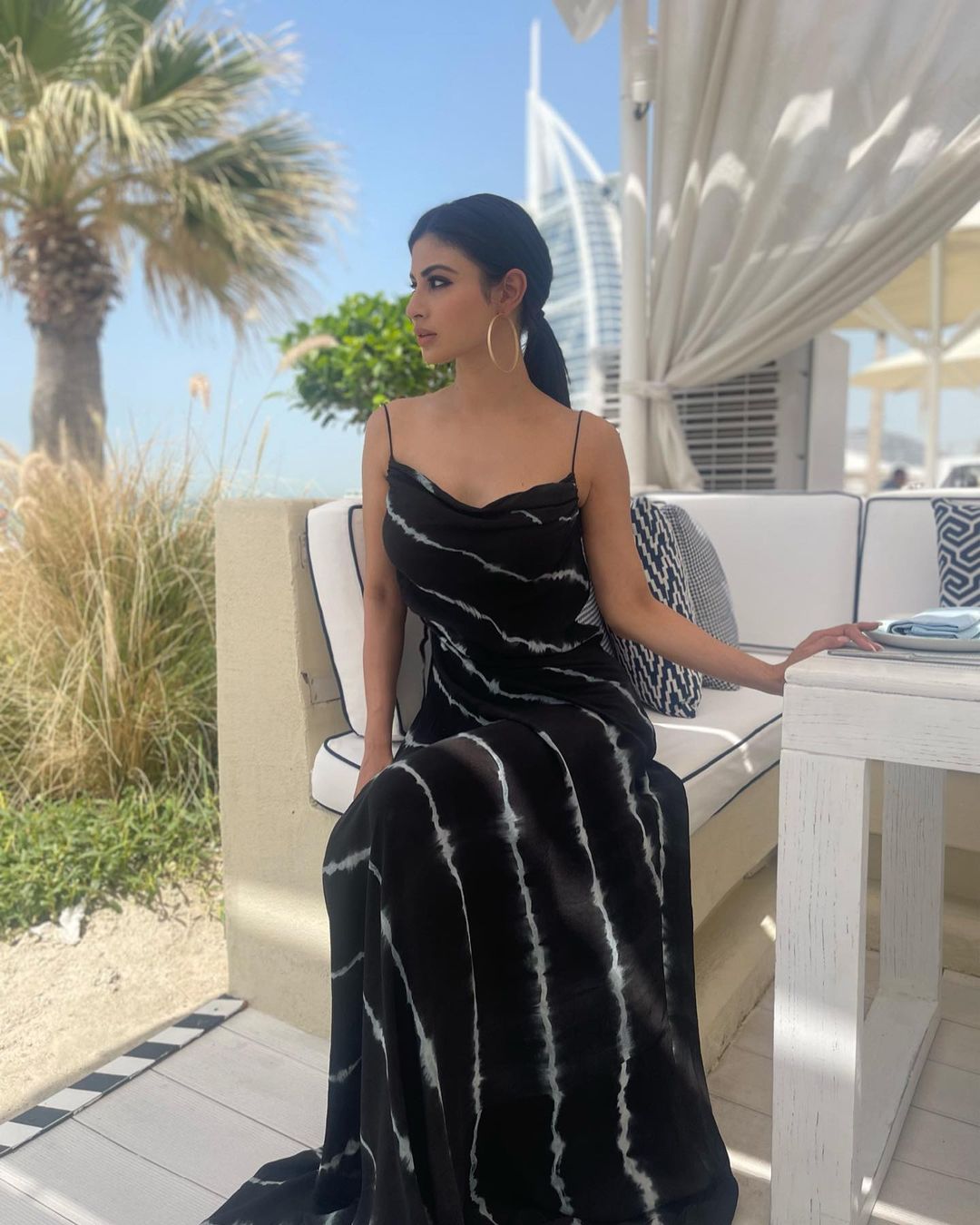 Mouni roy hot low neck fit tight dress photos on her vacation