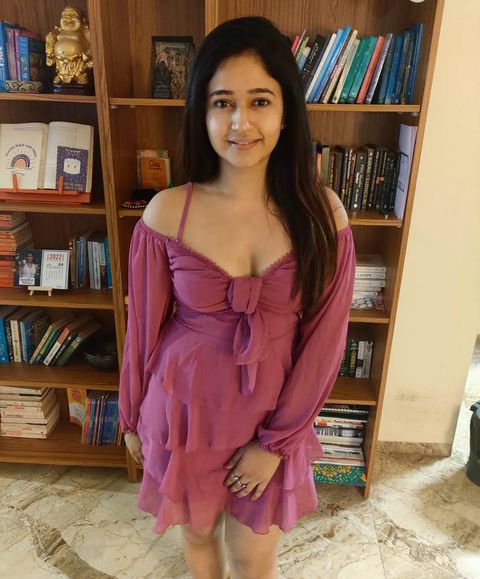 Poonam bajwa hot show in short gown low neck frock showing top angle