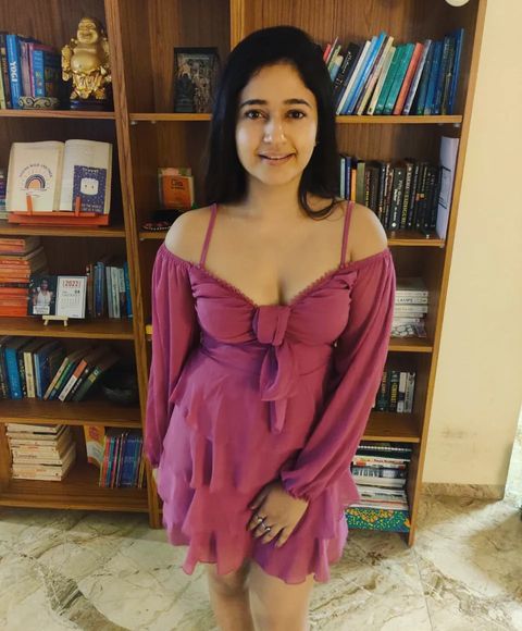 Poonam bajwa hot show in short gown low neck frock showing top angle