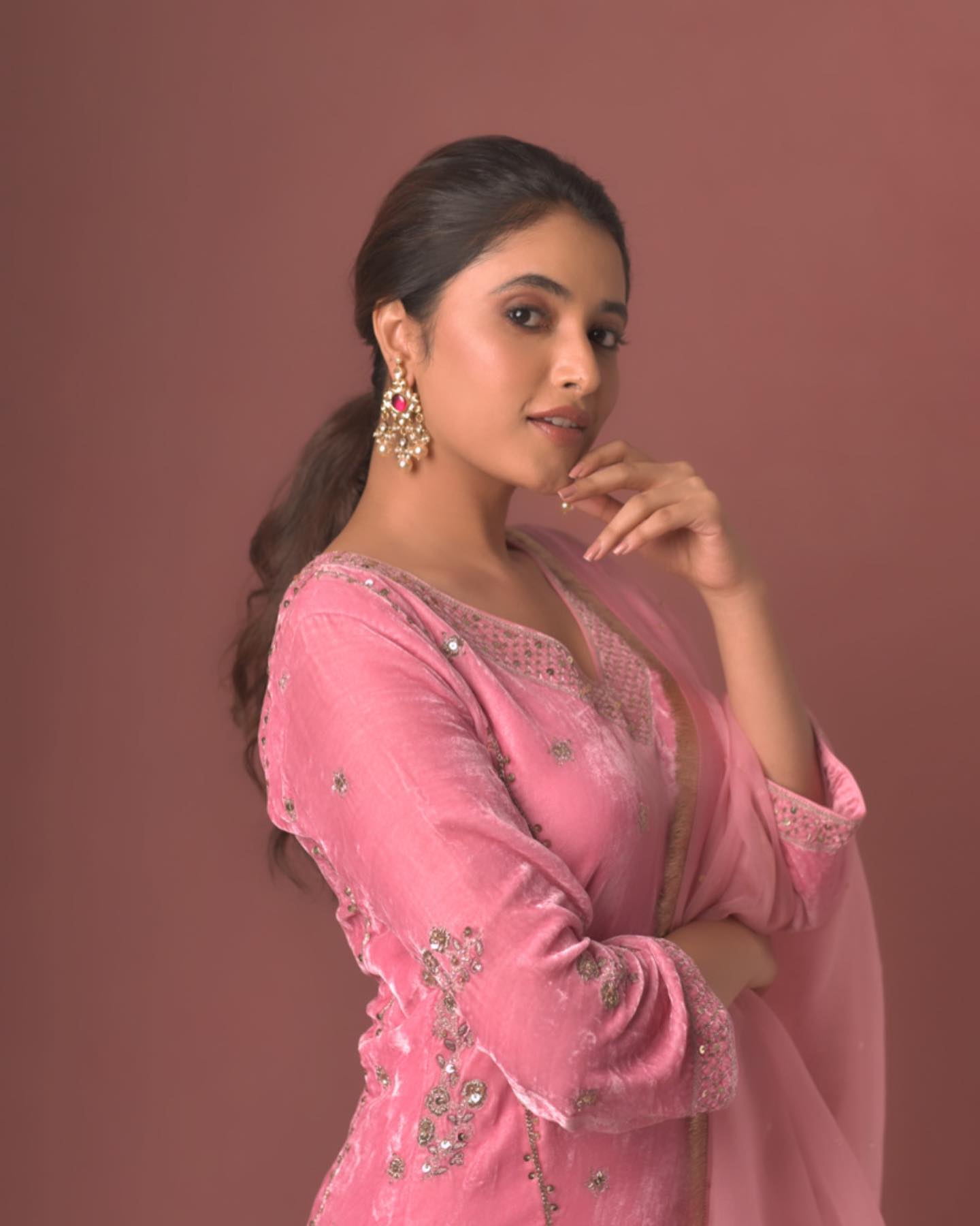 Priyanka mohan hot hip show in red grand lehenga photoshoot