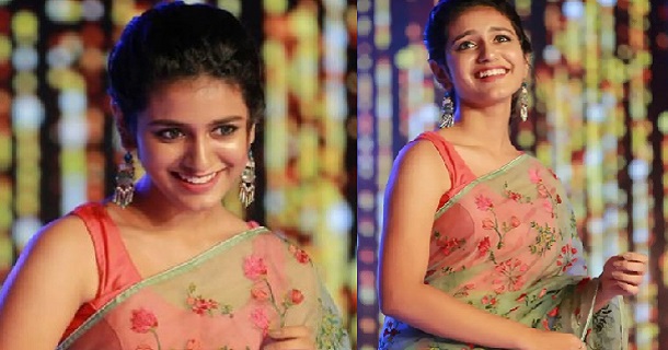 Priya varrier hot photos in tight modern dress getting likes shares and comments