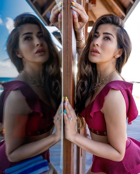 Raai laxmi hot stills having breakfast in bikini