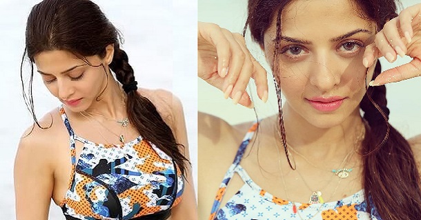 Vedhika hot shining dress photos in sunny climate
