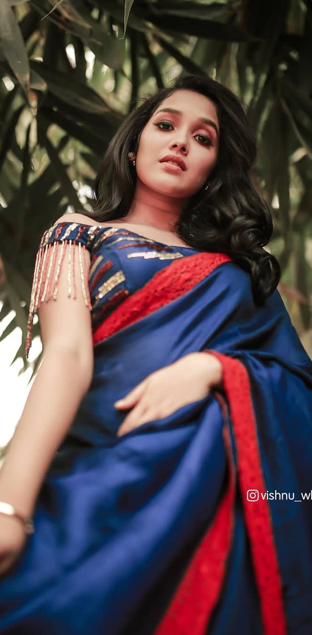 Anikha surendran hot posing in peacock dress