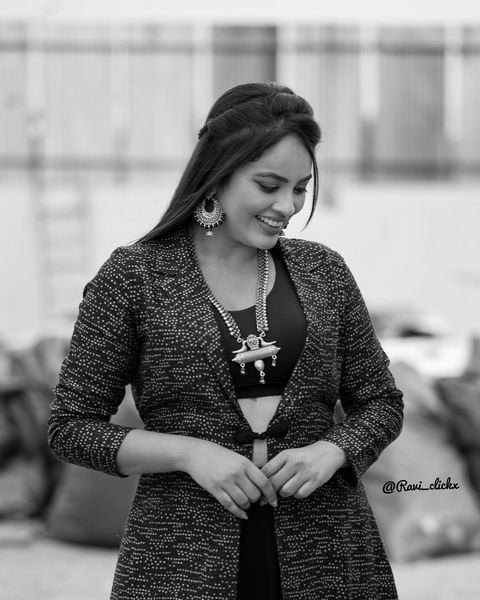 Nandita swetha hot hip showing photos in over coat and dress