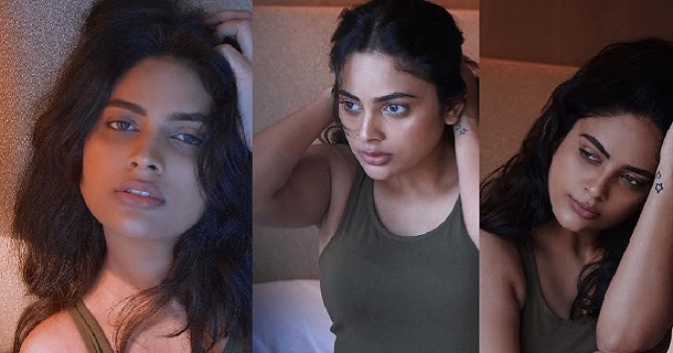 Nandita swetha hot hip showing photos in over coat and dress