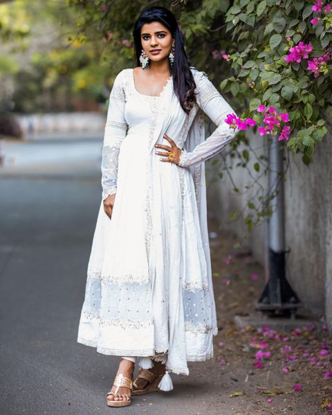 Aiswarya rajesh hot low neck white chudithar dress stills posted on social media