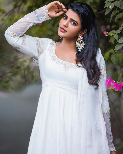 Aiswarya rajesh hot low neck white chudithar dress stills posted on social media