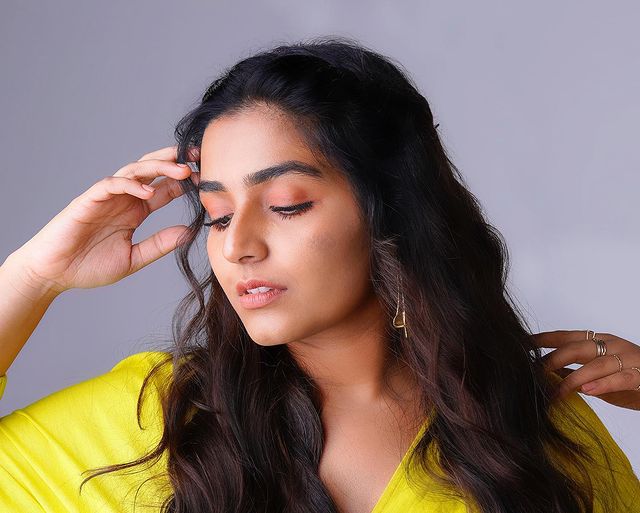 Rajisha vijayan hot yellow short dress photos posted on instagram