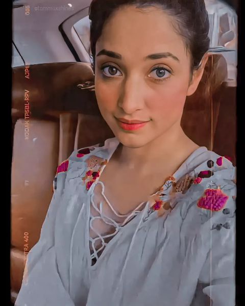 Tamanna bhatia hot in beach tasting tender coconut using straw