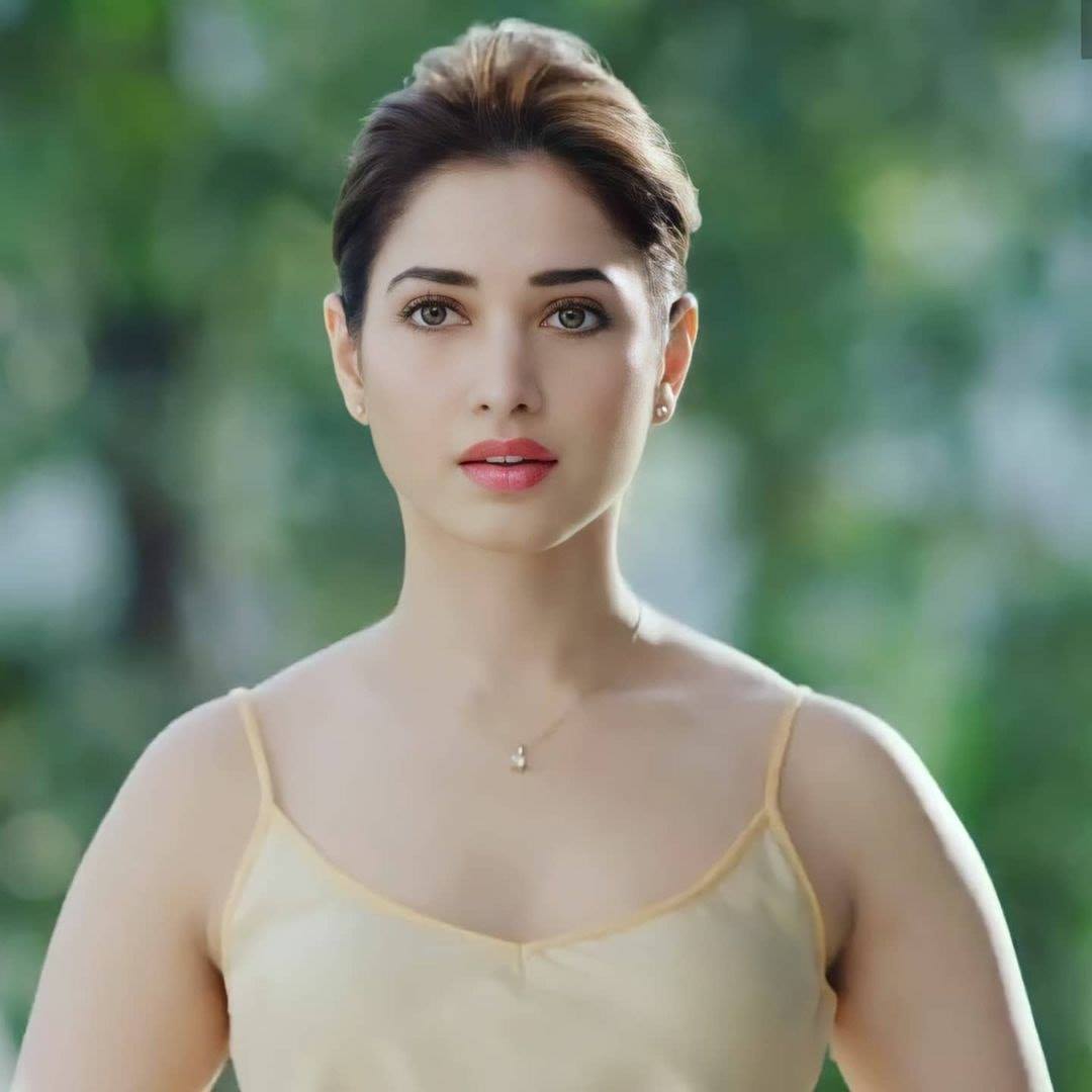 Tamanna bhatia hot in beach tasting tender coconut using straw