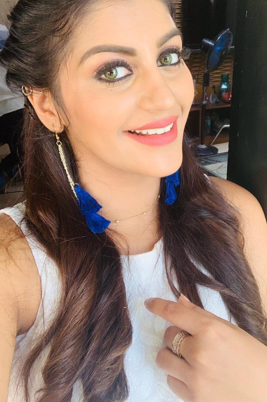 yashika anandh roaming in glamour dress in london where others are preventing themselves from winter netizens slamming yashika