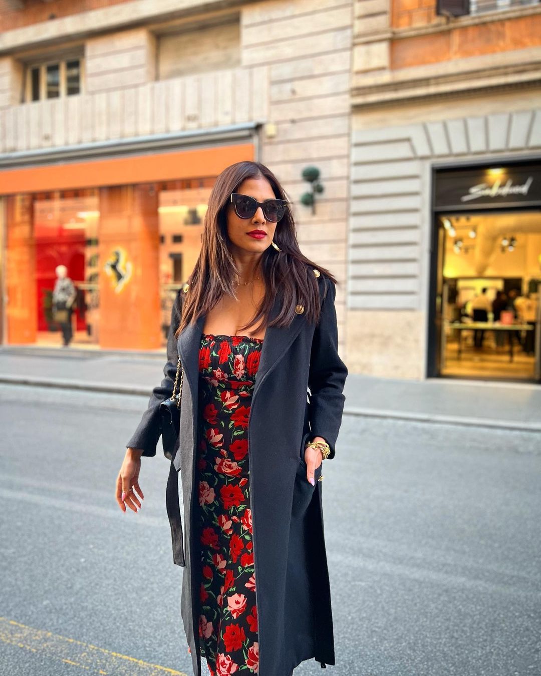 Malavika mohanan hot foreign trip photos overcoat on maxi dress