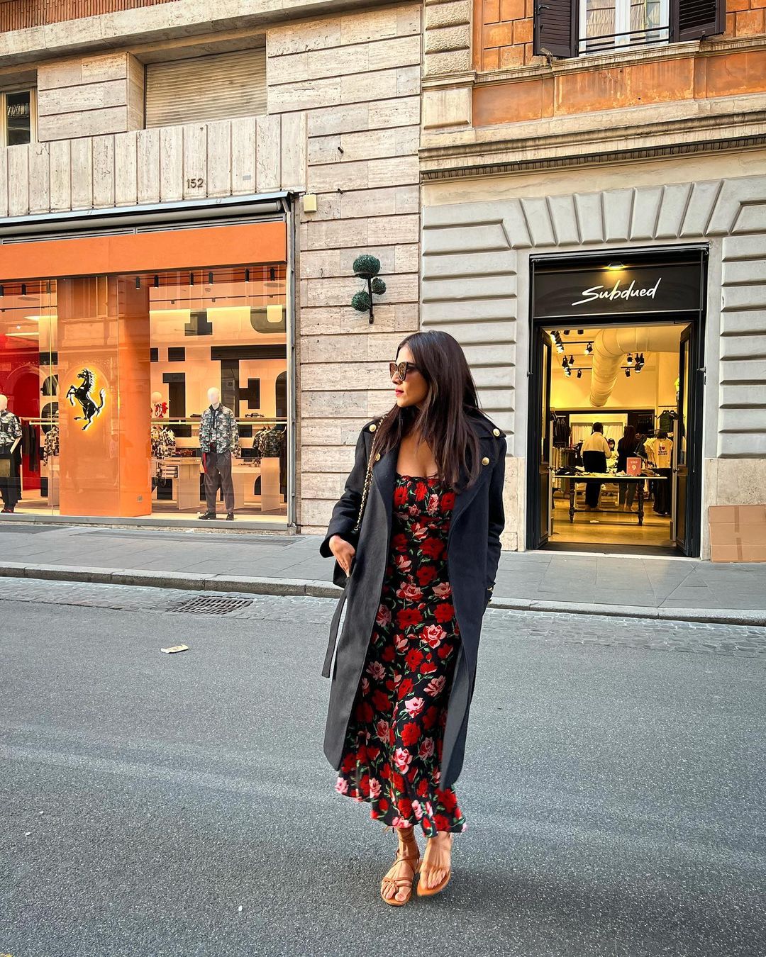 Malavika mohanan hot foreign trip photos overcoat on maxi dress