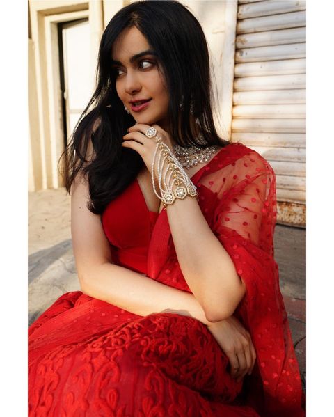Adah sharma hot posing in red colour grand lehenga