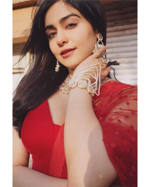 Adah sharma hot posing in red colour grand lehenga