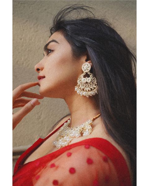 Adah sharma hot posing in red colour grand lehenga
