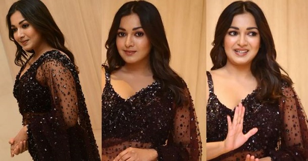 Catherine tresa hot photos in black saree looking chubby