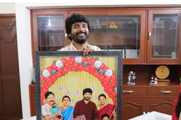 Sivakarthikeyan feels emotional on seeing his son in his father hands fan made drawing