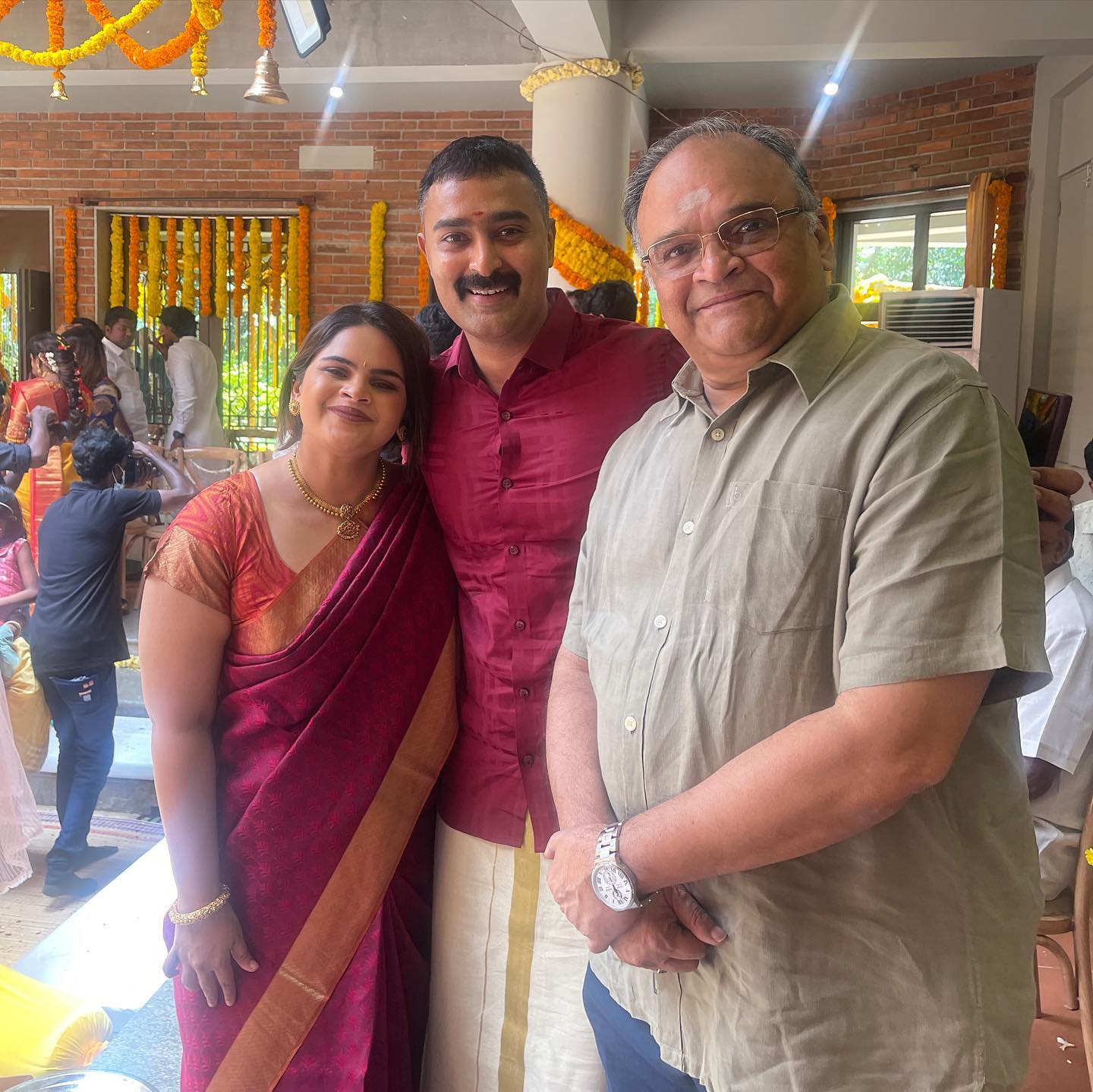 Dhanush and selvaragavan with actress vidhyulekha in family function