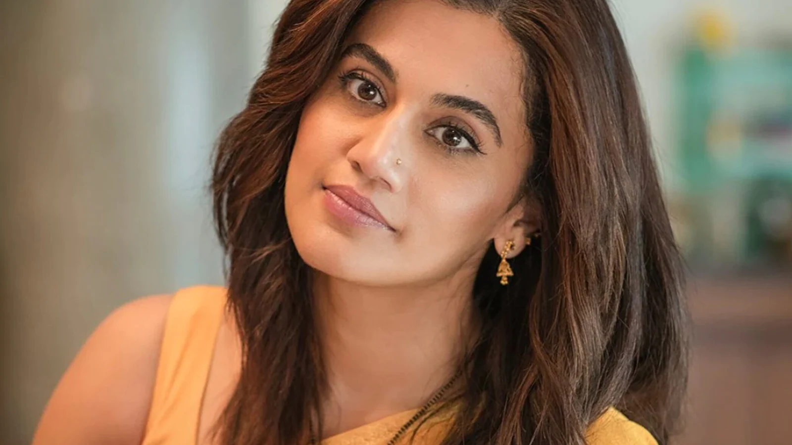 tamanna removes heel before light lamping and netizens scolds taapsee pannu