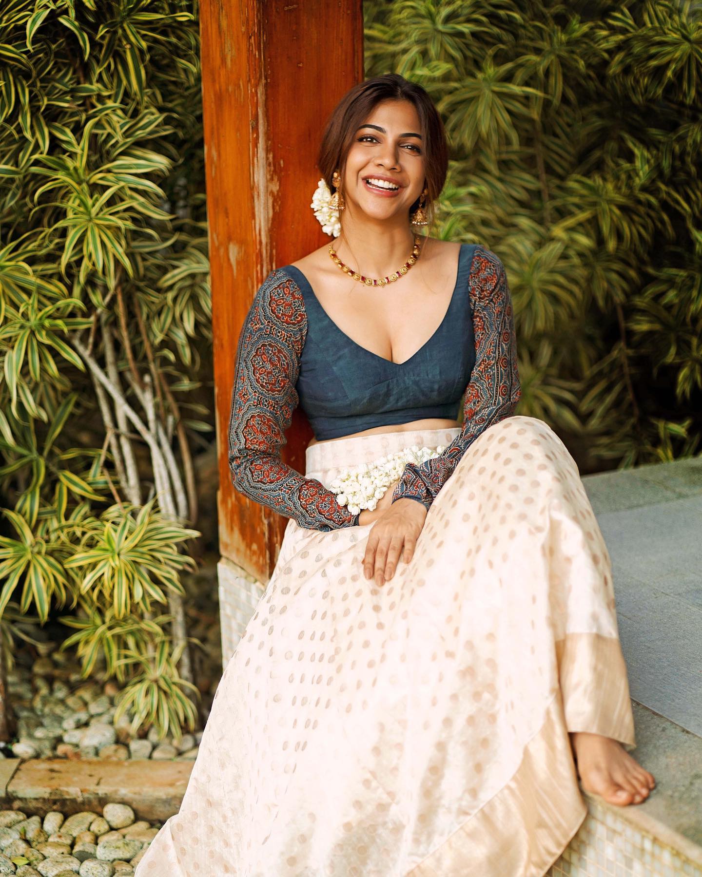 actress madonna sebastian hot glamour photos in low neck blouse