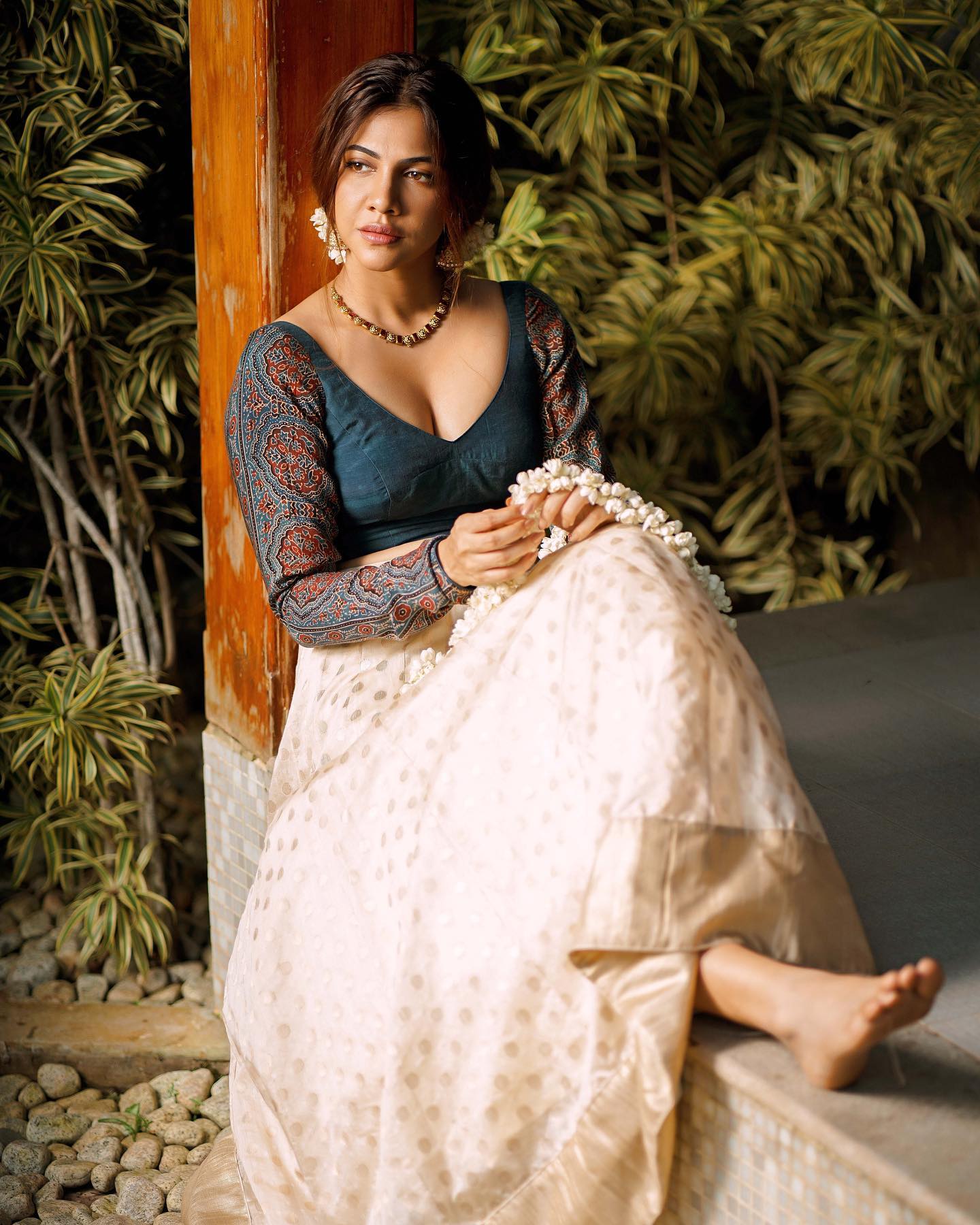 actress madonna sebastian hot glamour photos in low neck blouse