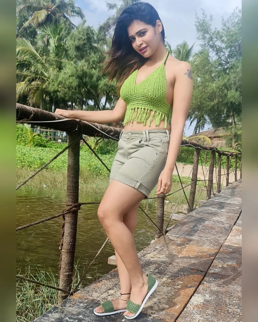 dharsha gupta hot photos in low neck glamour dress getting viral