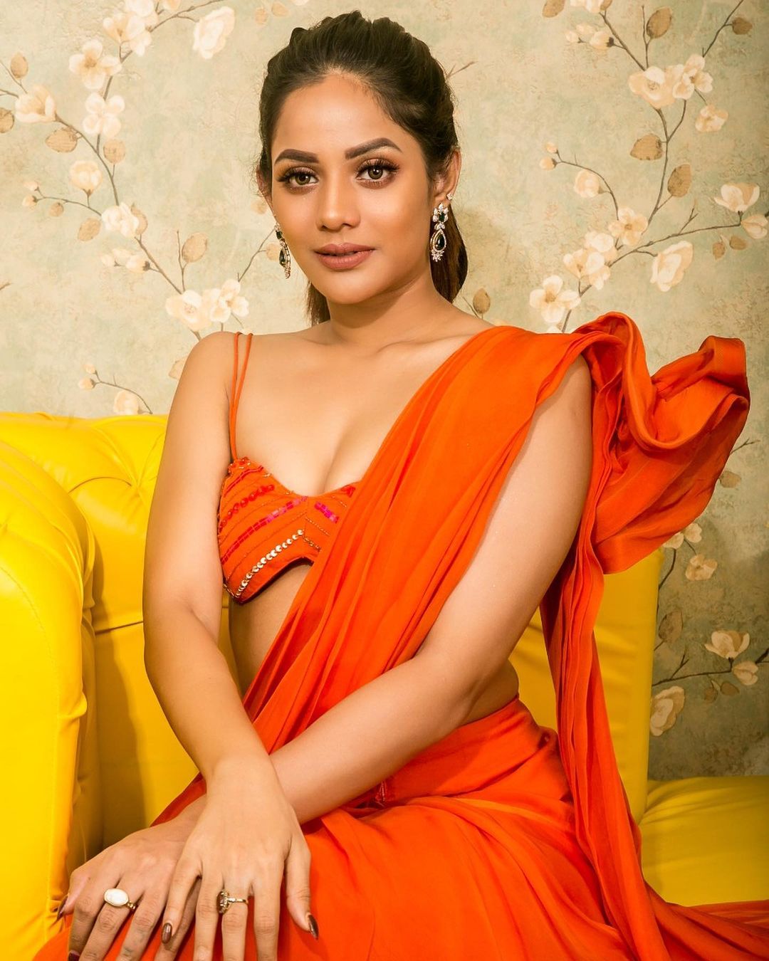 aiswarya dutta hot photos in orange colour dress getting viral