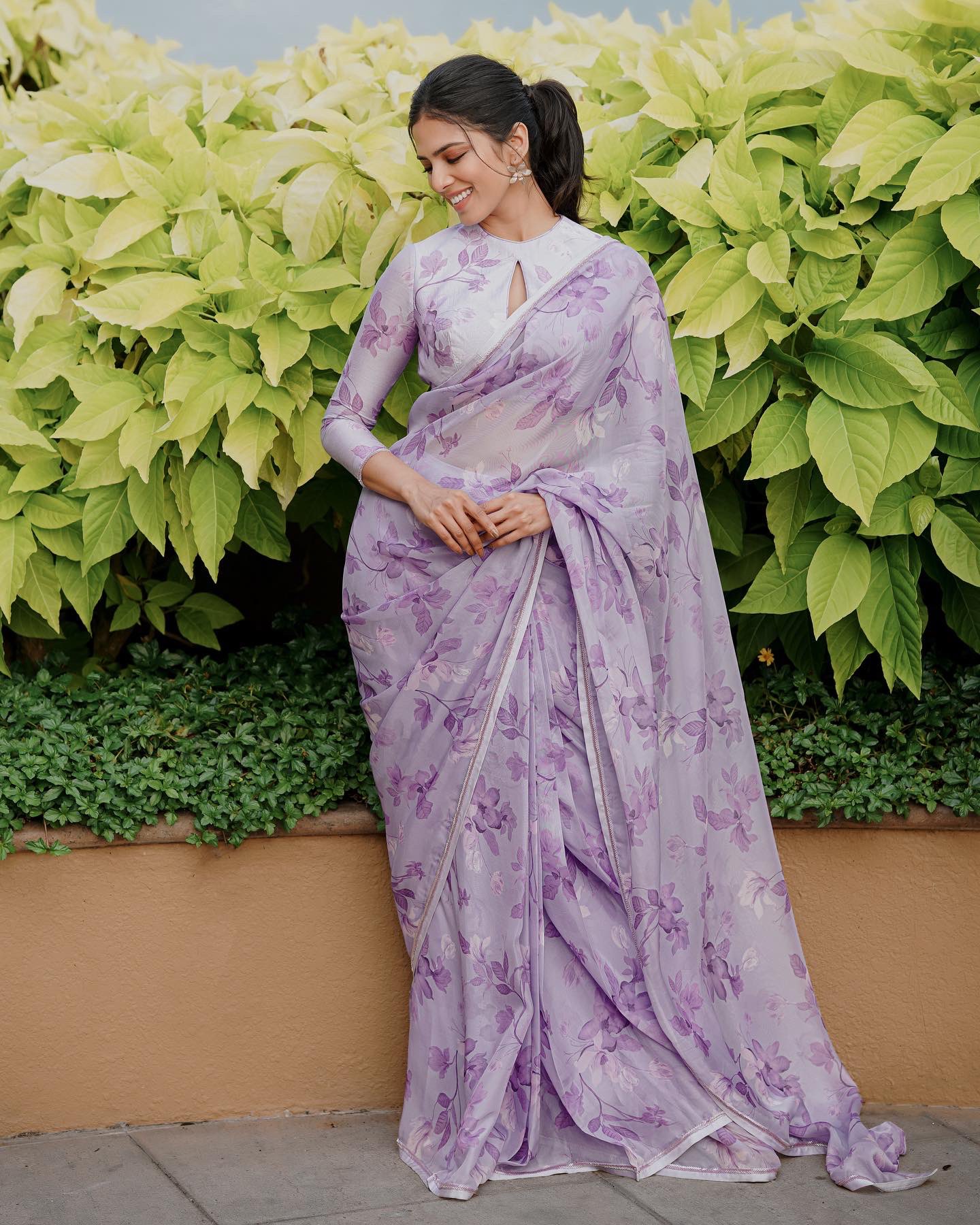 malavika mohanan latest hot photos in saree getting viral on social media