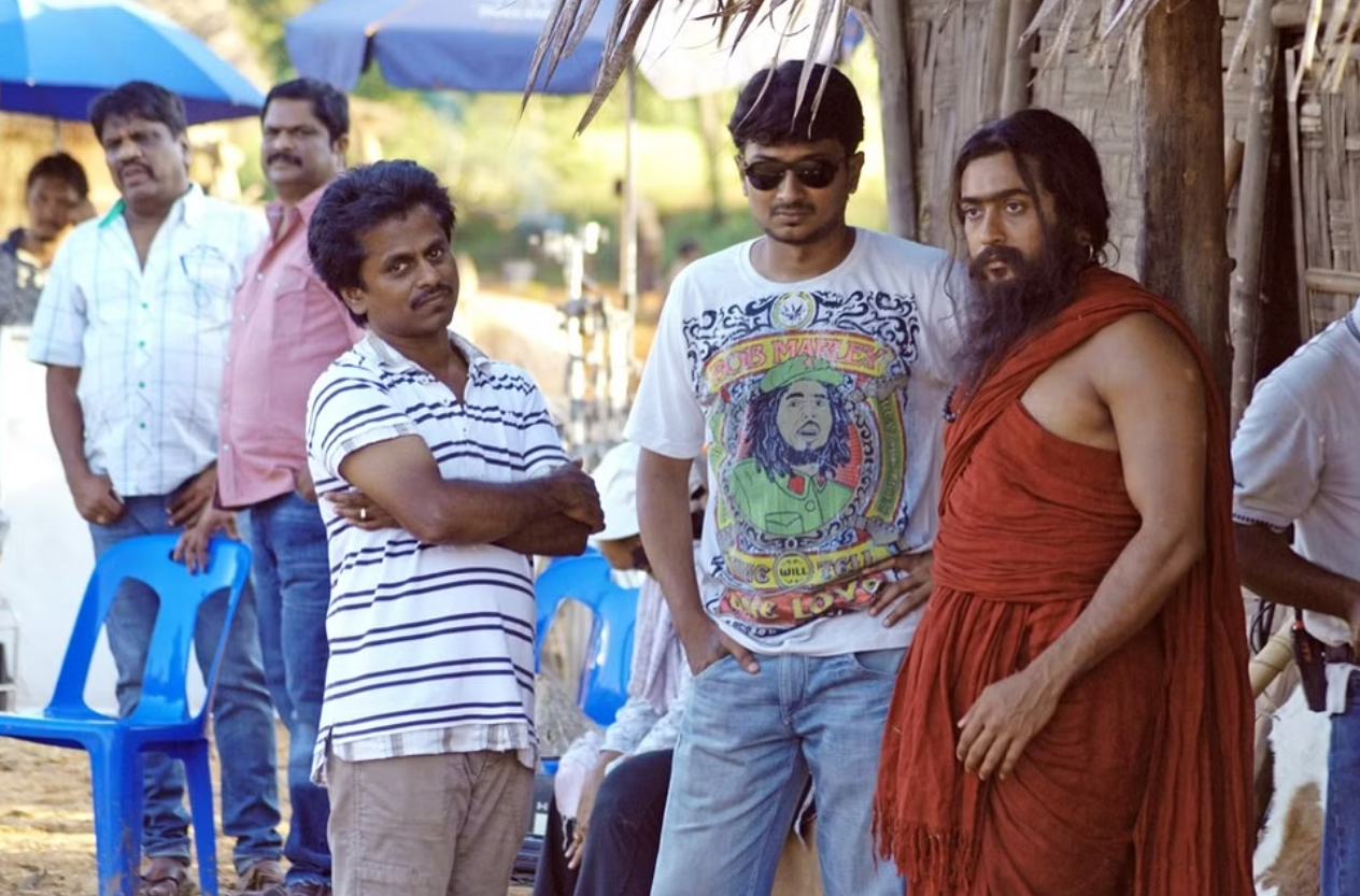 udhayanidhi stalin in 7aum arivu movie making still with suriya and armurugadoss photo getting viral on social media